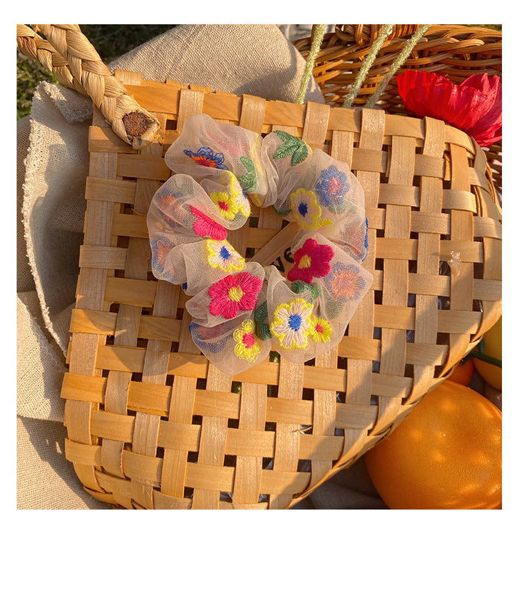 Elástico de cabelo em rede com flores bordadas