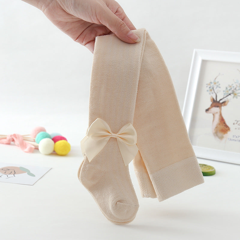 Collants de bebé com padrão de rede e laço grande