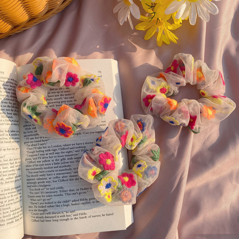 Elástico de cabelo em rede com flores bordadas