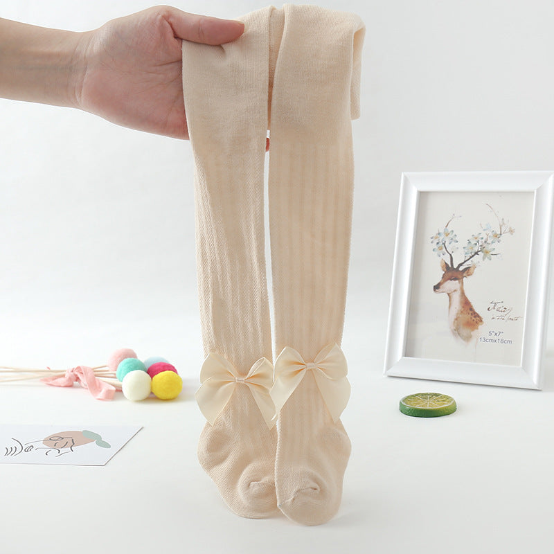 Collants de bebé com padrão de rede e laço grande