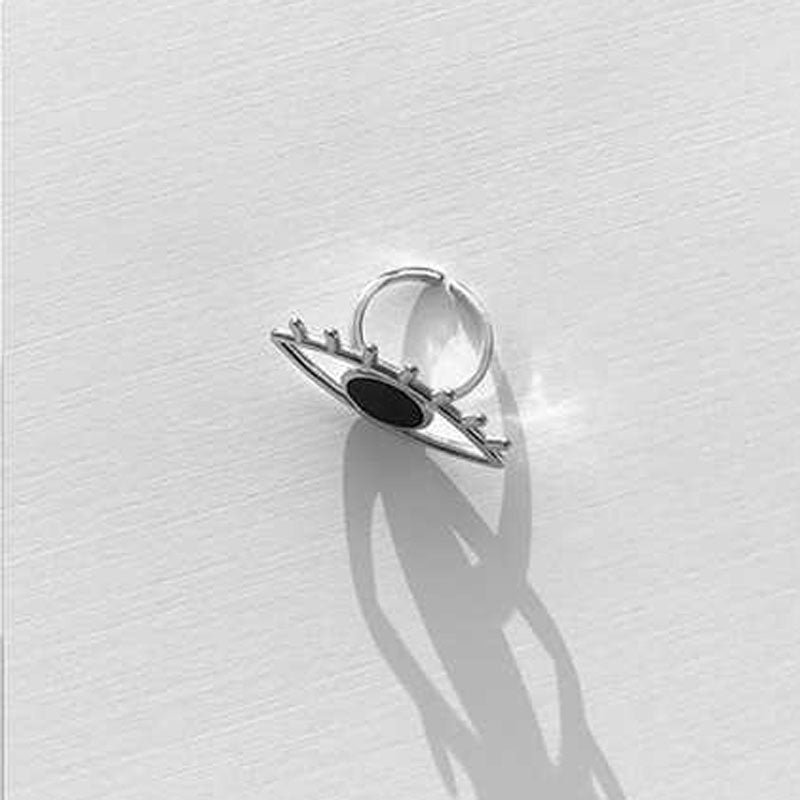 Long cutout eye stud earrings