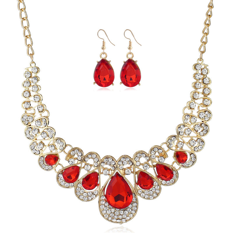 Amerikanisches Modeschmuck-Set: Metall-Halskette und Ohrringe mit Edelstein-Diamant-Anhängern für Bräute