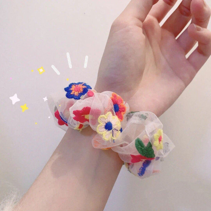 Elástico de cabelo em rede com flores bordadas