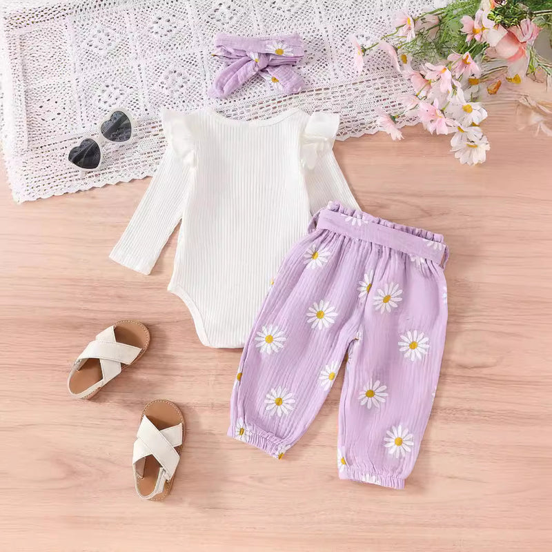 Ruffled Long-sleeve Bodysuit Paired With Matching Pants And A Bow Hair Accessory