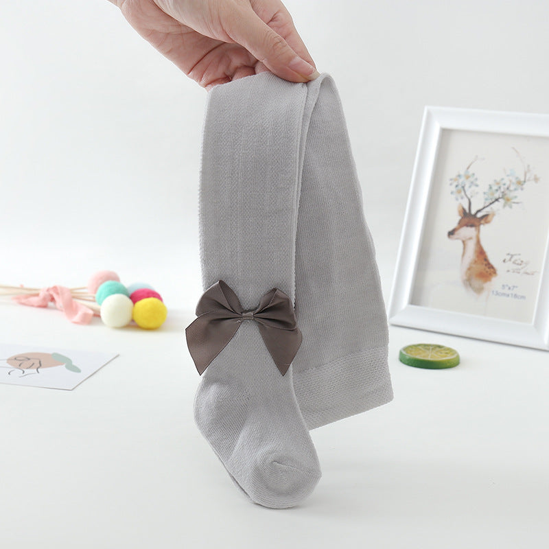 Collants de bebé com padrão de rede e laço grande