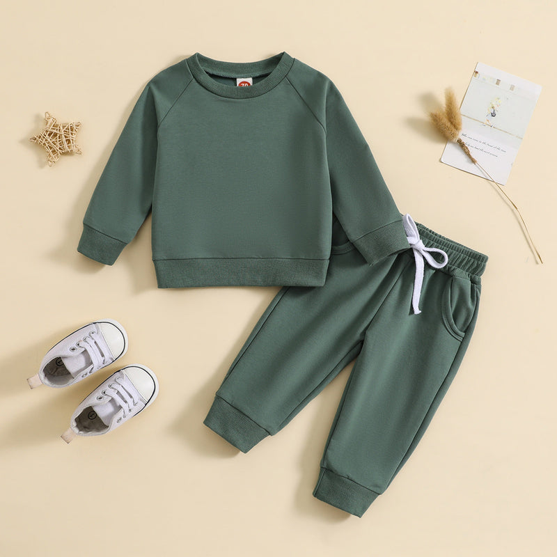 Conjunto de camisola de gola redonda e calças de cor lisa para menino