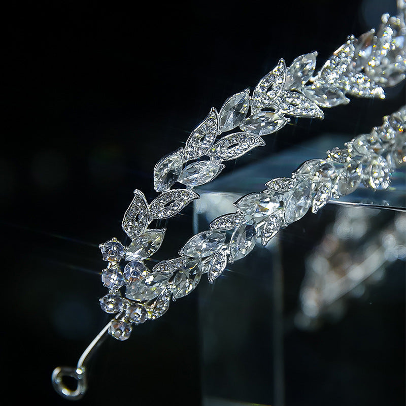Die neue Kronen-Brauthaarschmuck-Kopfbedeckung mit Kristallen