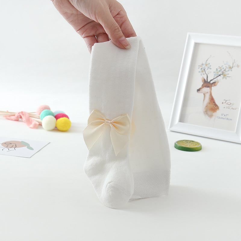 Collants de bebé com padrão de rede e laço grande