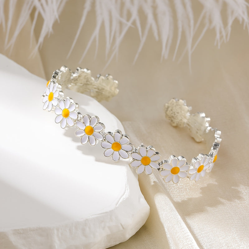 Kreatives Armband mit weißem Blütendesign aus Tropföl