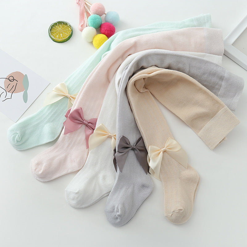 Collants de bebé com padrão de rede e laço grande