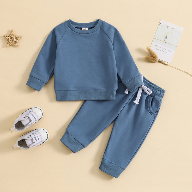 Conjunto de camisola de gola redonda e calças de cor lisa para menino