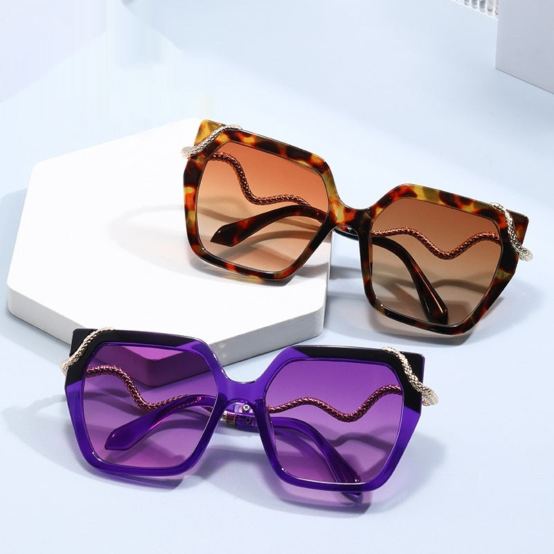 Retro quadratische Sonnenbrille mit Schlangenmuster für einen stylischen Look