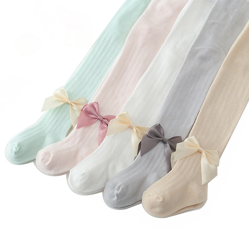Collants de bebé com padrão de rede e laço grande